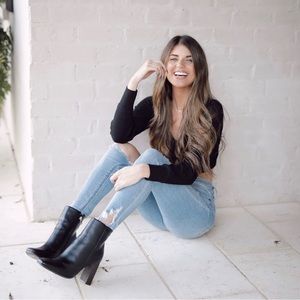 Heeled black booties